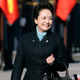 Illustration for article titled Chinas First Lady Wears a Black Trench Coat, Everyone Goes Nuts for Black Trench Coats